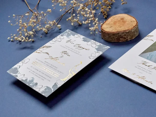 creative save the date cards flat lay showing foil, photo, and postcard formats side by side wedding stationery