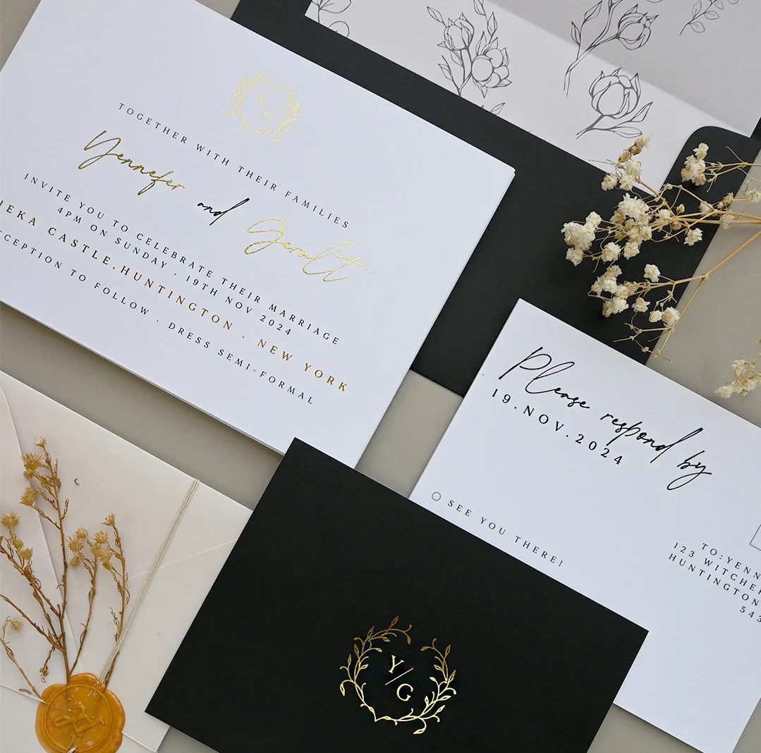 Elegant wedding invitation suite with gold flat foil script names, wreath crest and botanical envelope liner