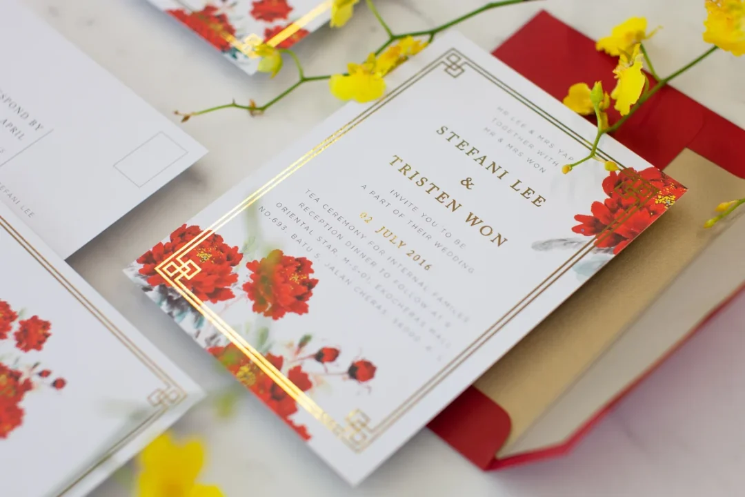 Halloween wedding invitation suite showing save the date and invitation in black with white ink and gold foil detail wedding stationery
