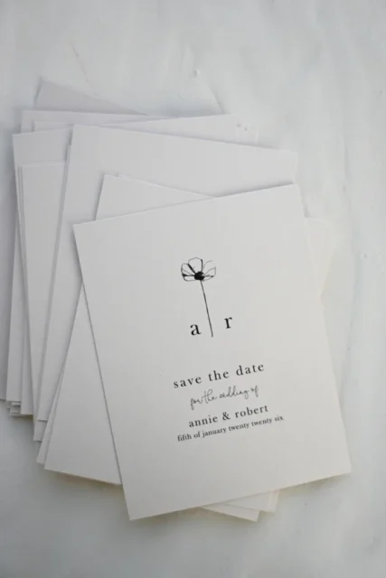 How to print Canva wedding invitations — minimalist white save the date cards with simple floral illustration