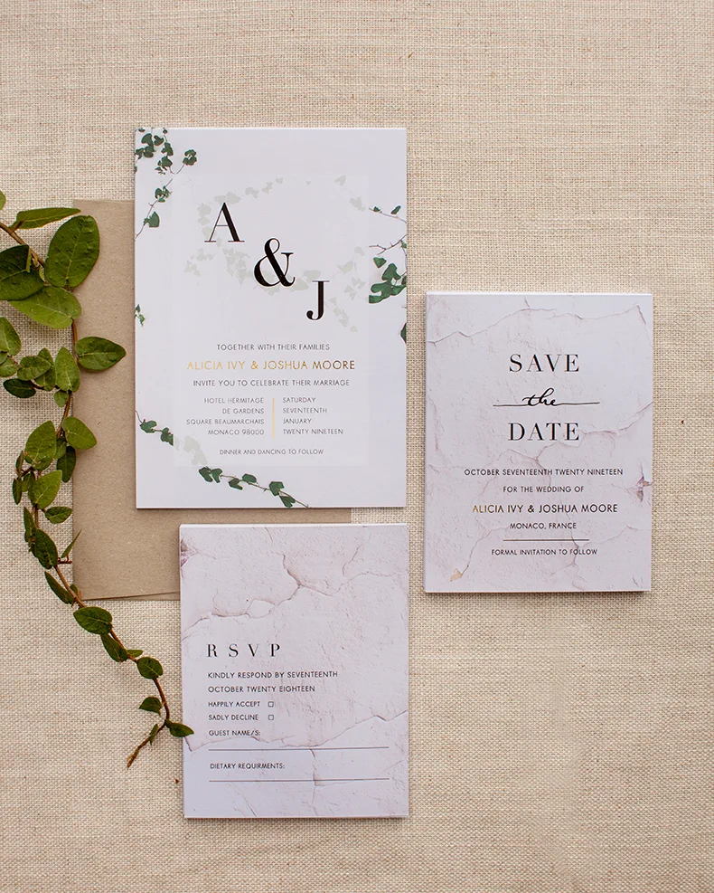 printed wedding invitation cards on different paper stocks - matte, textured, kraft - showing quality comparison wedding stationery