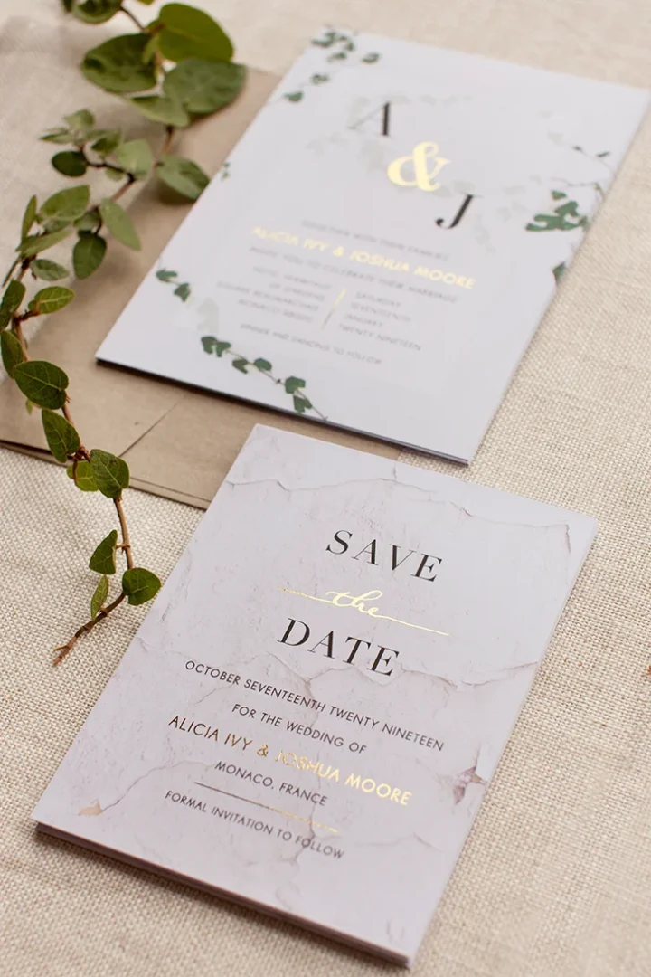 professionally printed wedding invitation with foil background detail on cotton paper - close-up showing texture and shine wedding stationery