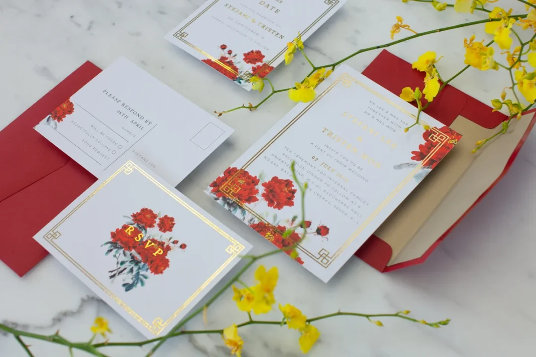 Coordinated wedding stationery suite with botanical designs showing multiple pieces