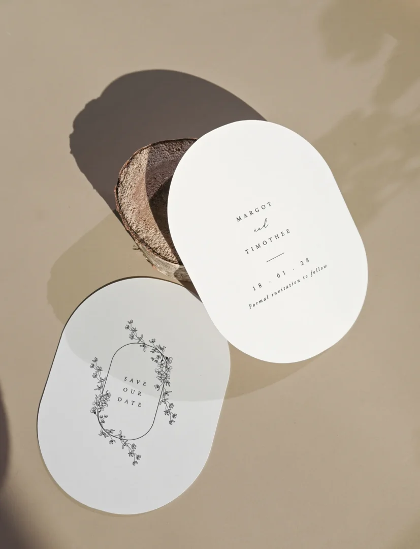 couple toasting champagne glasses at an elegant anniversary dinner, candlelight, warm celebratory atmosphere, 10-year milestone wedding stationery