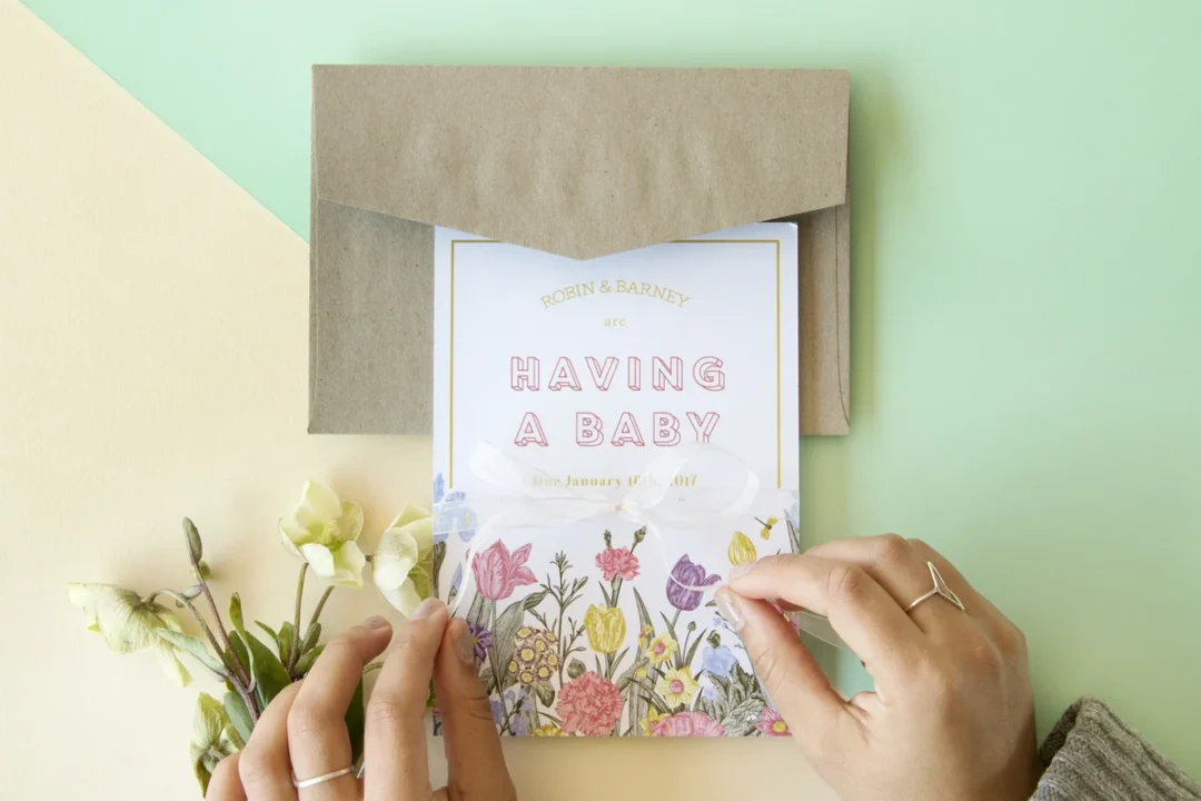elopement announcement card design - clean typography with small illustrative botanical element, 