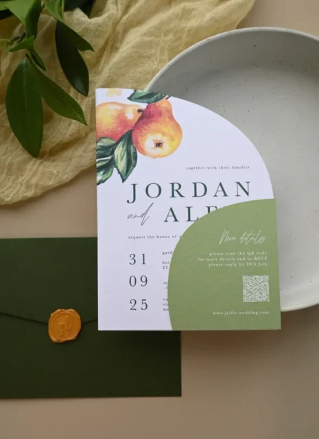 overhead flatlay of a wedding invitation suite on ivory linen - cream A7 envelope with a wax seal closure beside a partially visible invitation card, soft window light from the left, no text overlays wedding stationery