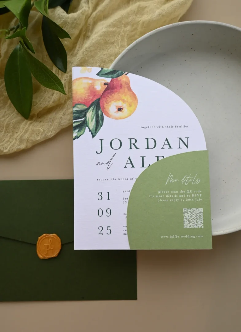 overhead flatlay of a wedding invitation suite on ivory linen - cream A7 envelope with a wax seal closure beside a partially visible invitation card, soft window light from the left, no text overlays wedding stationery