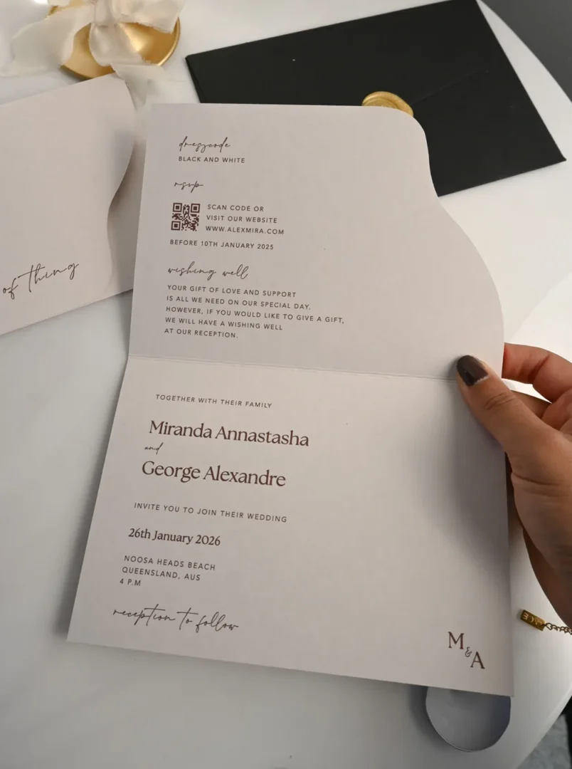 Paperlust Miranda and George modern minimalist arch bifold wedding invitation showing dress code, QR code RSVP, wishing well note, and ceremony details on one tidy panel: Paperlust