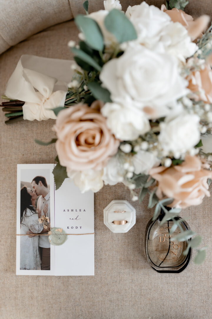 Gatefold wedding invitation with wax seal and dried flowers