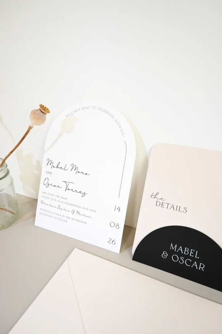 travel-themed invitation suite with a boarding pass wallet invite, matching luggage tag, and destination-themed envelope displayed on a navy map backdrop wedding stationery