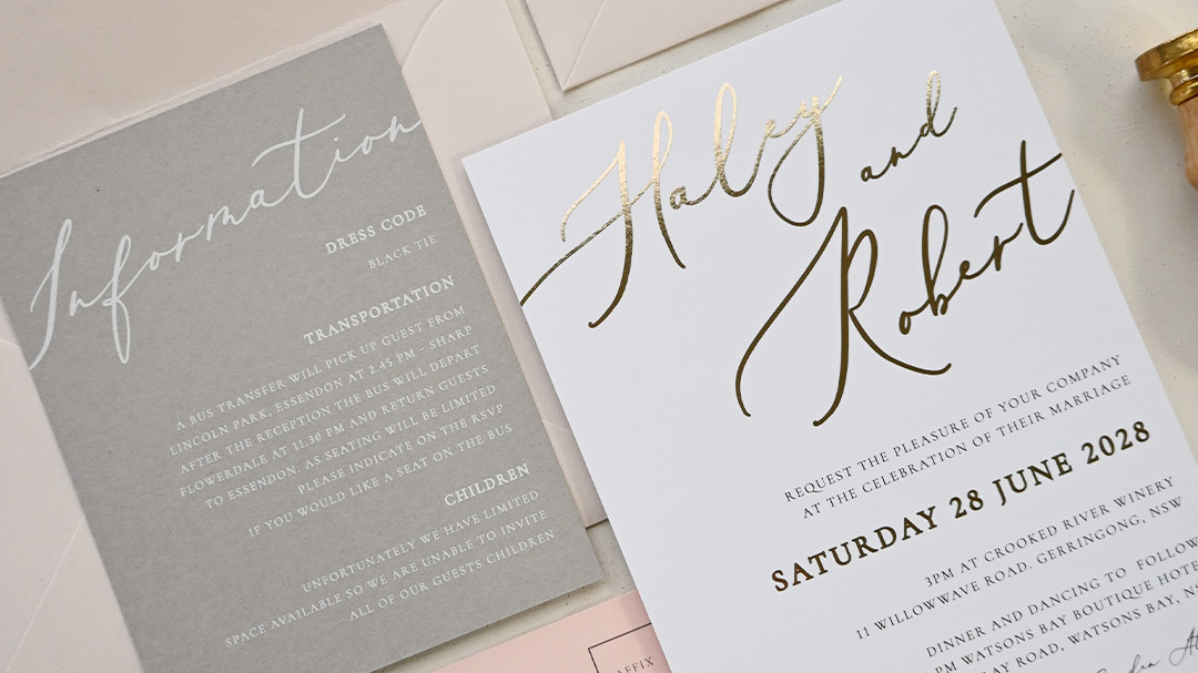Wedding invitation suite flatlay with neutral palette and modern typography
