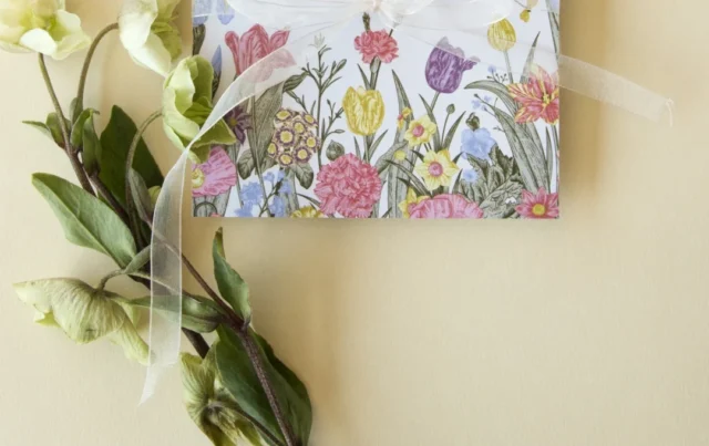 Paperlust floral baby announcement card detail with flowers