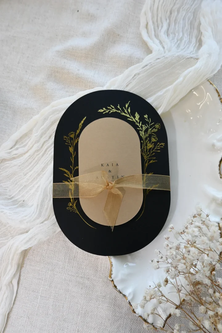 Bridal shower invitation in a celebratory flatlay with fresh flowers and elegant typography