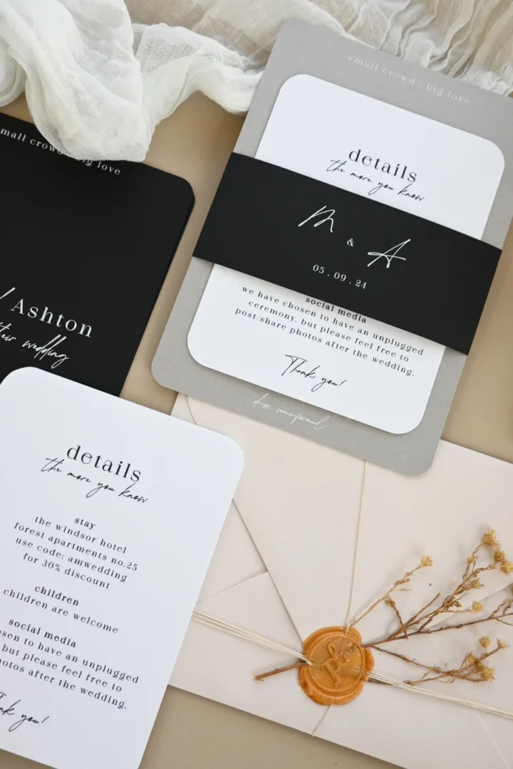 Modern bridal shower invitation with arch silhouette in a styled flatlay