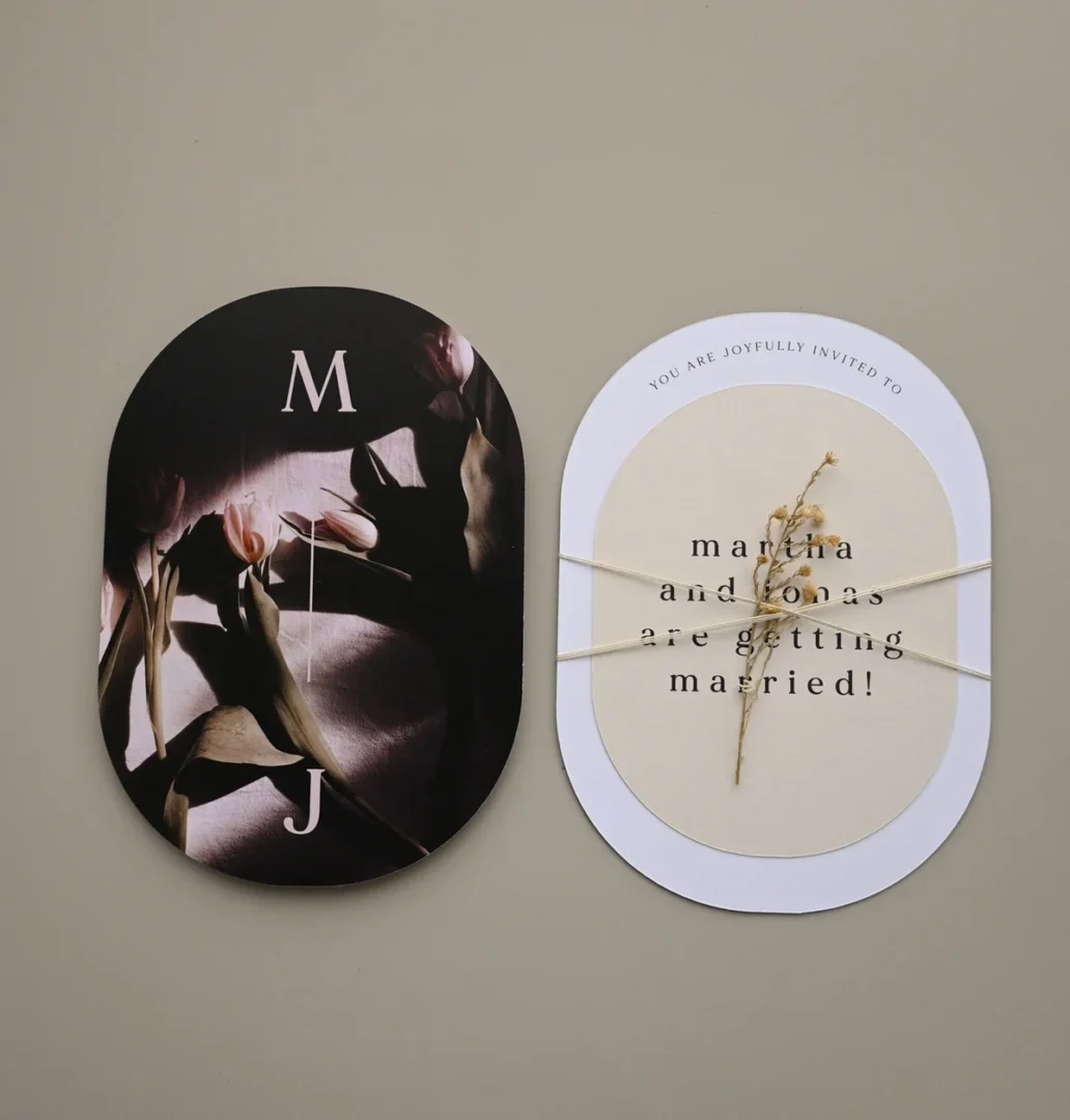 Elegant bridal shower invitation in a styled lifestyle flatlay with floral accents and soft natural lighting