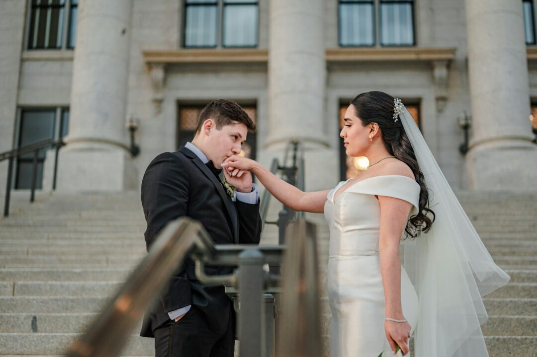 Couple at courthouse steps after wedding ceremony