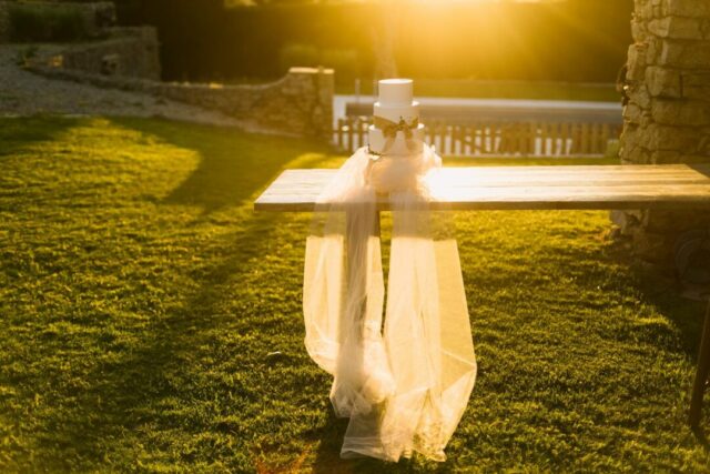 Farm table set for intimate garden wedding reception