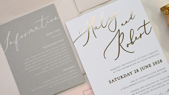 Wedding invitation suite flatlay with neutral palette and modern typography
