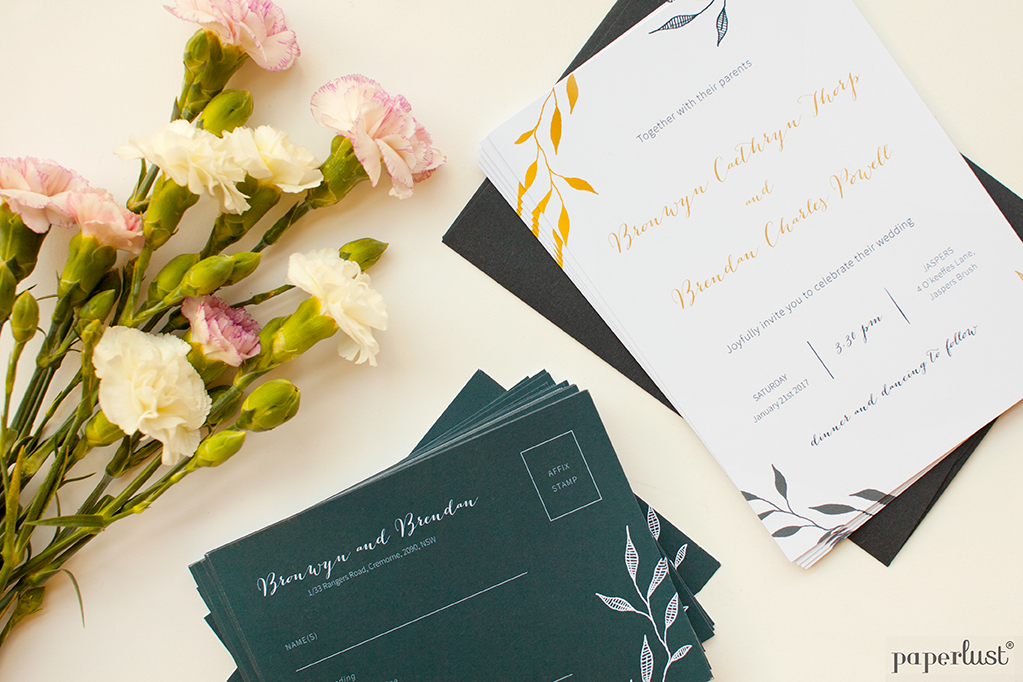 Paperlust forest green and gold wedding invitation suite, white invitation with gold foil script, dark forest green RSVP postcards, cream pink carnations on cream linen