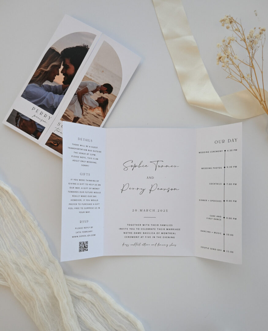 Paperlust open gatefold wedding invitation revealing inside spread with couple photo panel, handwritten script names, and timeline