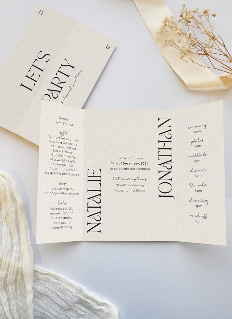 Paperlust Gateway recycled kraft speckled trifold accordion wedding invitation showing stock texture as the design