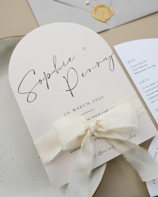 Paperlust Harmony arch wedding invitation showcasing full sculptural silhouette and warm neutral palette