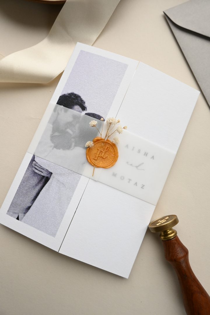 Paperlust invitation, Beautifully styled wedding invitation flatlay featuring a vellum belly band with wax seal