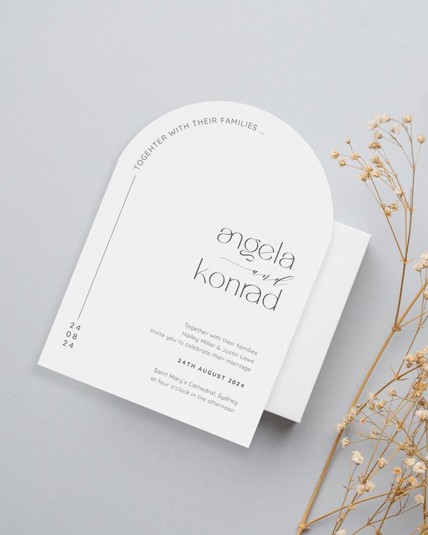 Paperlust Modern Pebble wedding invitation with rounded pebble die-cut silhouette and mixed-script names