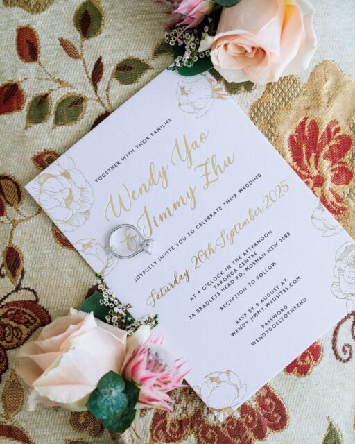 Paperlust Wendy and Jimmy wedding invitation with gold flat foil peony line-art illustration framing the names
