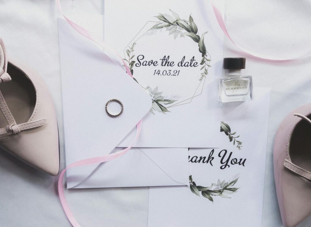 Save the date postcard featuring custom illustrated map of wedding city with florals