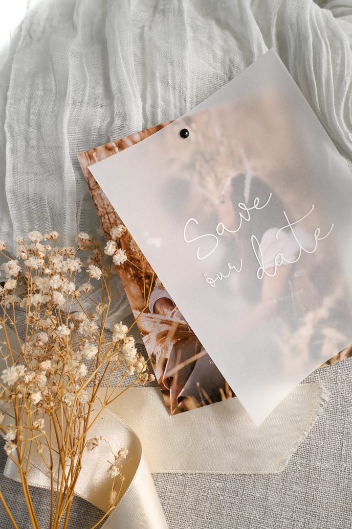 Paperlust landscape save the date card with warm terracotta dreamy sky photo in lifestyle styling