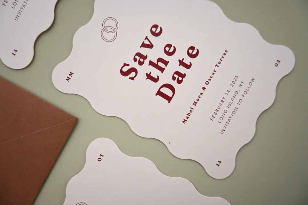 Paperlust retro wavy save the date card product flat lay