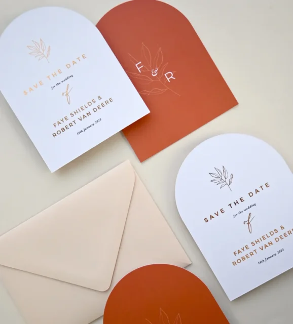 Paperlust terracotta arch save the date suite display