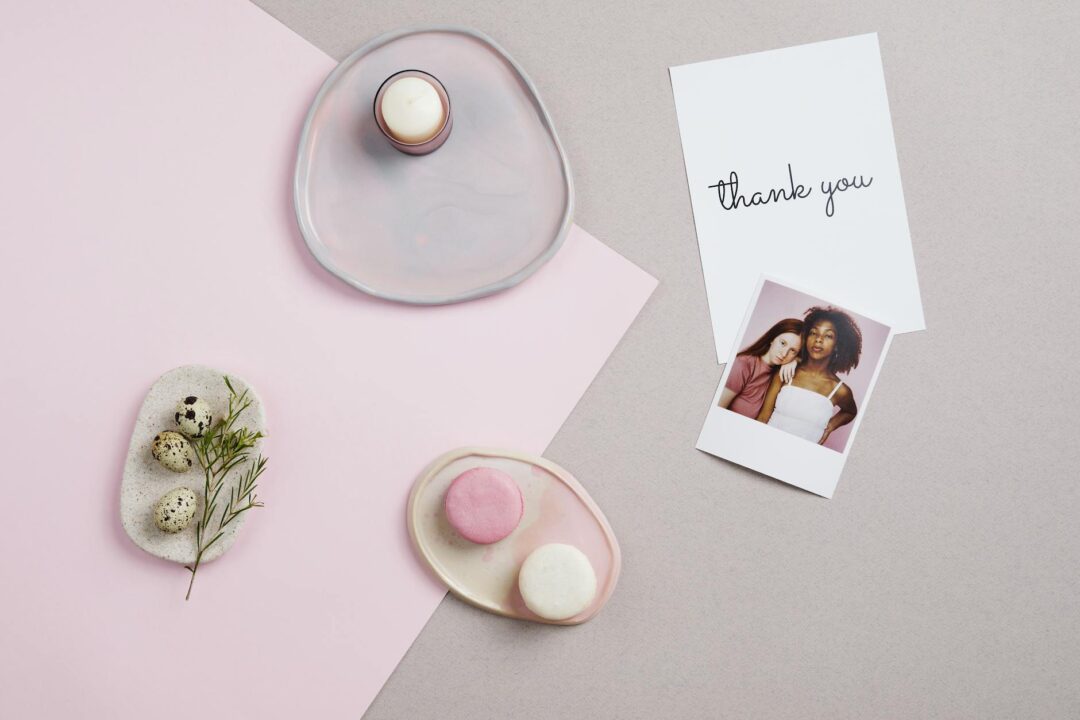 Paperlust thank you card stationery suite, multiple card designs fanned out on a marble surface, mix of botanical, minimal, and foil style