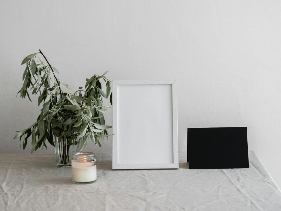 Elegant printed wedding menu cards styled on a linen table setting with ceramic plates and floral centerpiece