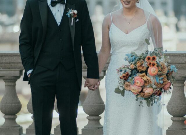 Couple at outdoor Chicago wedding with skyline backdrop