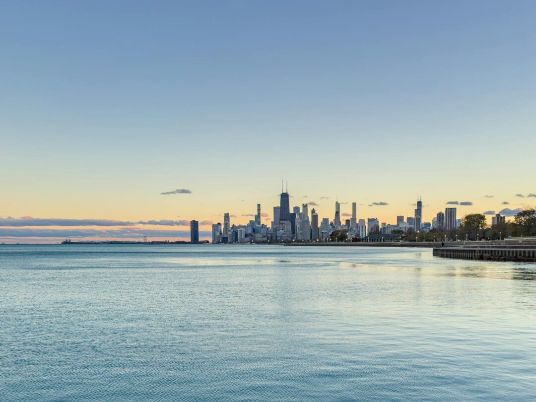 Chicago skyline at sunset over Lake Michigan