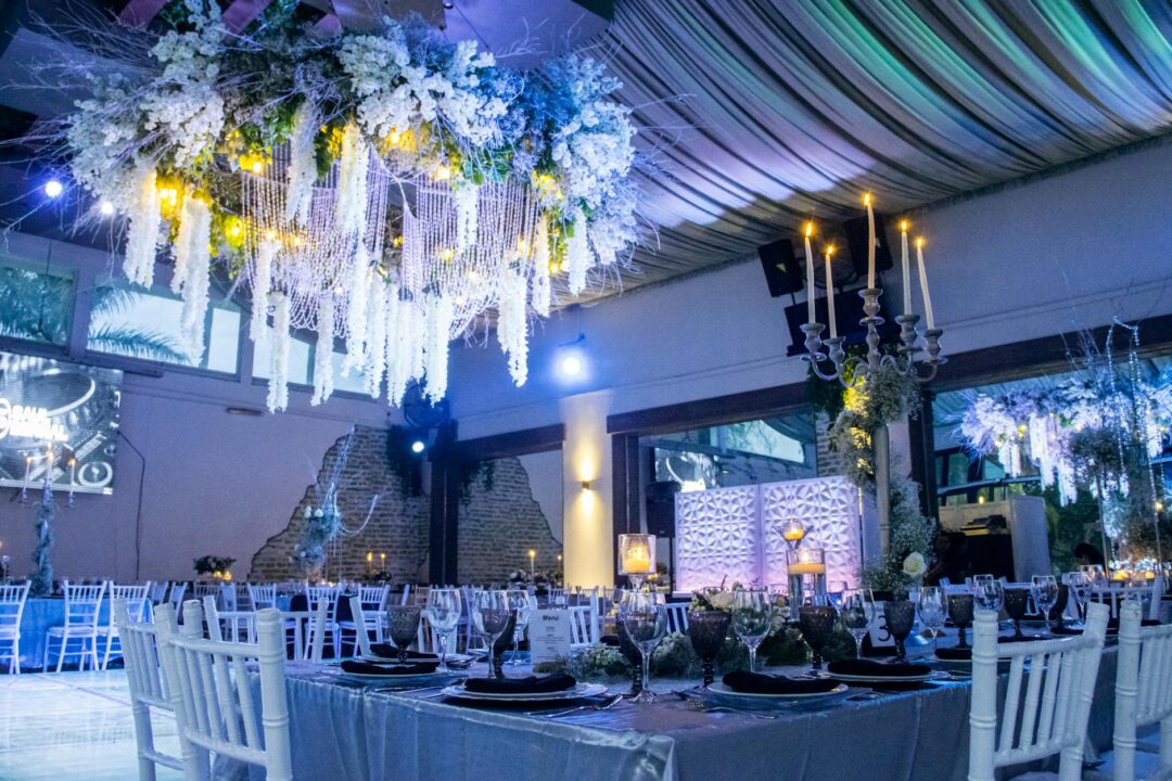 Wedding reception in historic hall with coffered ceiling