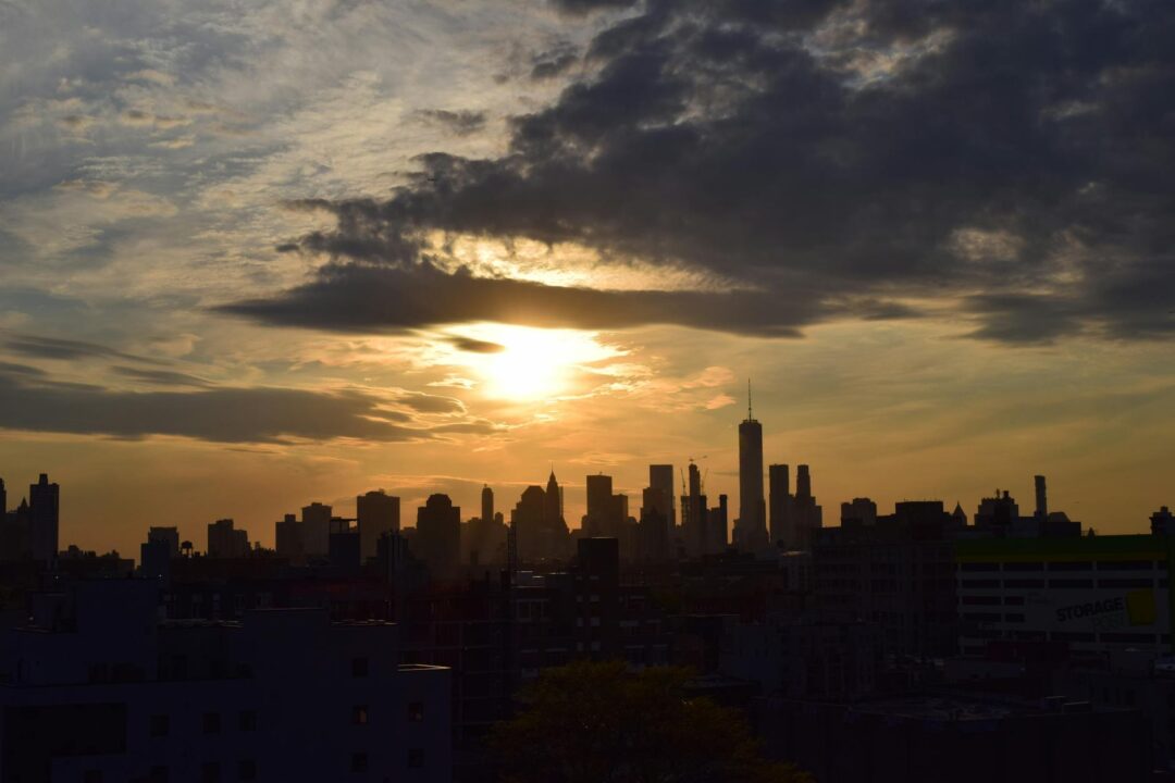 Manhattan rooftop wedding ceremony with city skyline