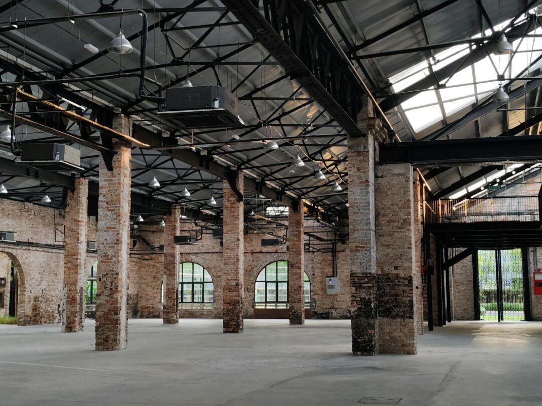 Brooklyn warehouse wedding reception with Edison chandeliers