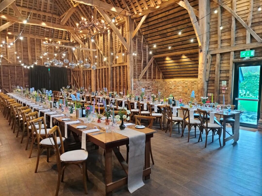 Industrial warehouse wedding reception with festoon lighting