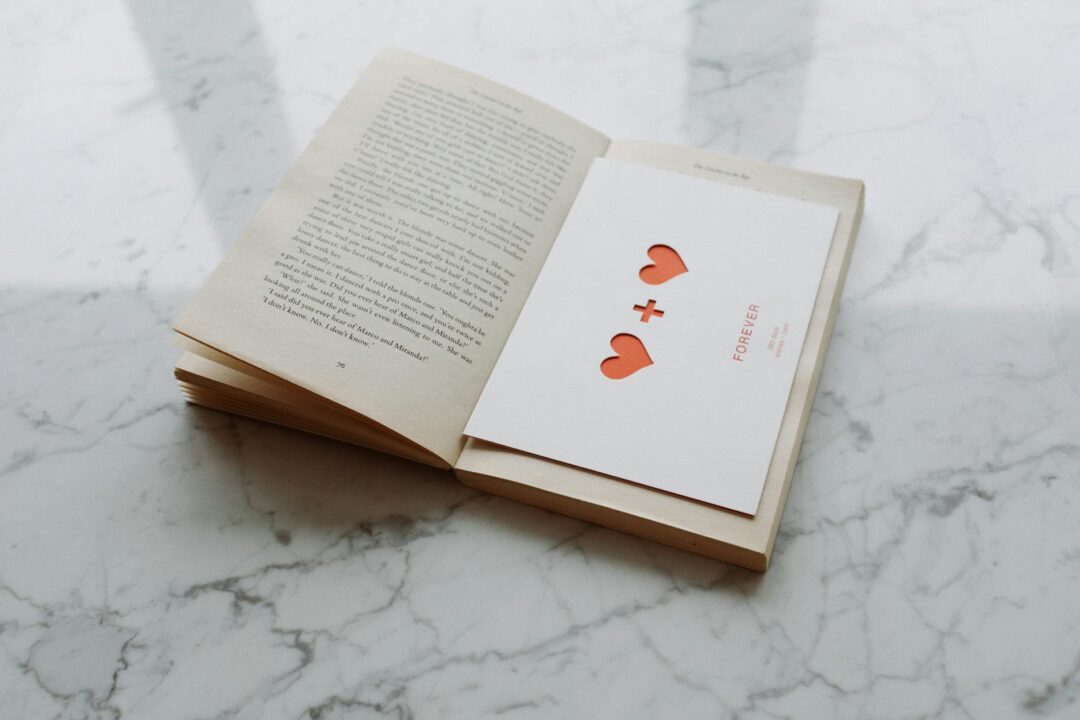 Paperlust save the date arch-shaped cards styled on linen with botanical illustration, elegant minimalist design, natural shadow play