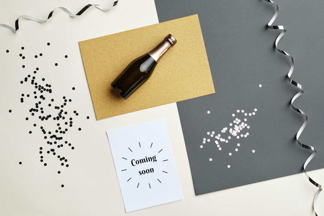 Paperlust save the date card with gold flat foil accents and elegant calligraphy displayed on a marble surface, lifestyle flatlay