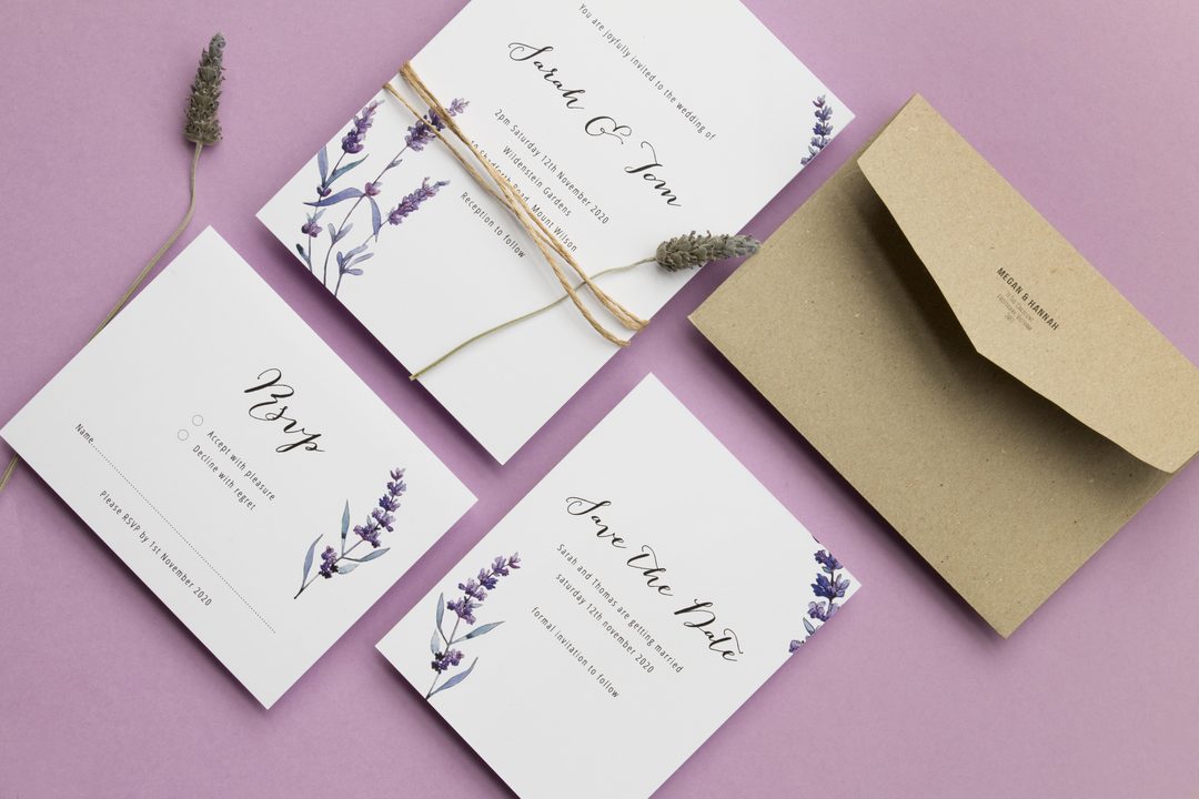 Paperlust invitation, Beautifully styled lavender-themed wedding suite flatlay with invitation