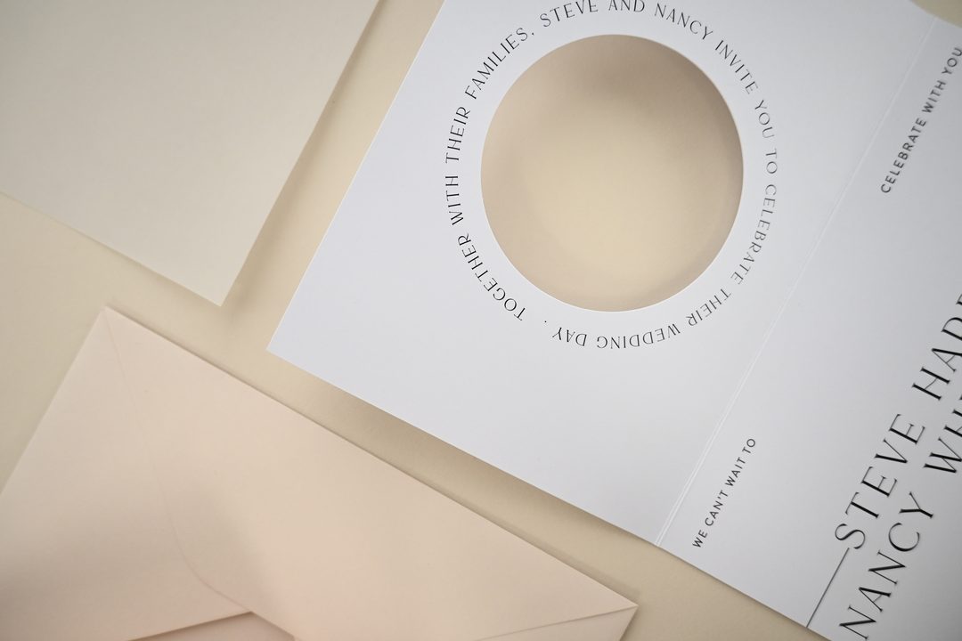 Paperlust invitation, Beautifully styled modern wedding invitation with die-cut circle detail