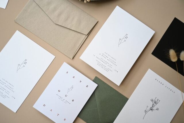 Paperlust invitation, Beautifully styled flatlay of a minimalist wedding stationery suite featuring delicate botanical line drawings