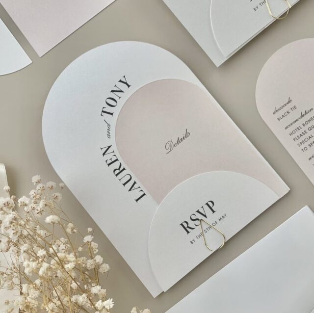 Paperlust invitation, Beautifully styled arch-shaped wedding suite featuring invitation