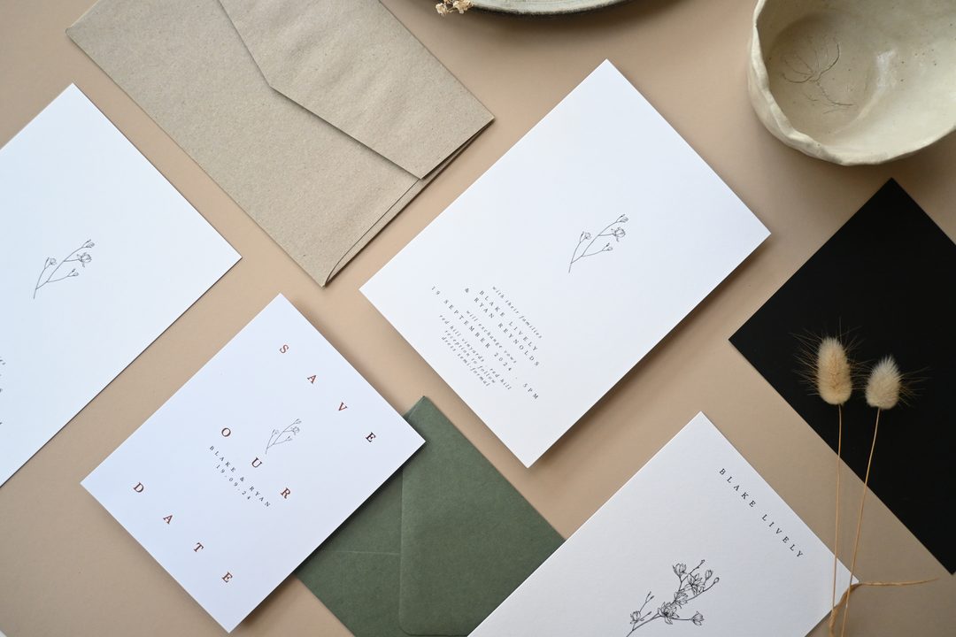 Paperlust invitation, Beautifully styled minimalist wedding stationery suite flat lay with neutral tones