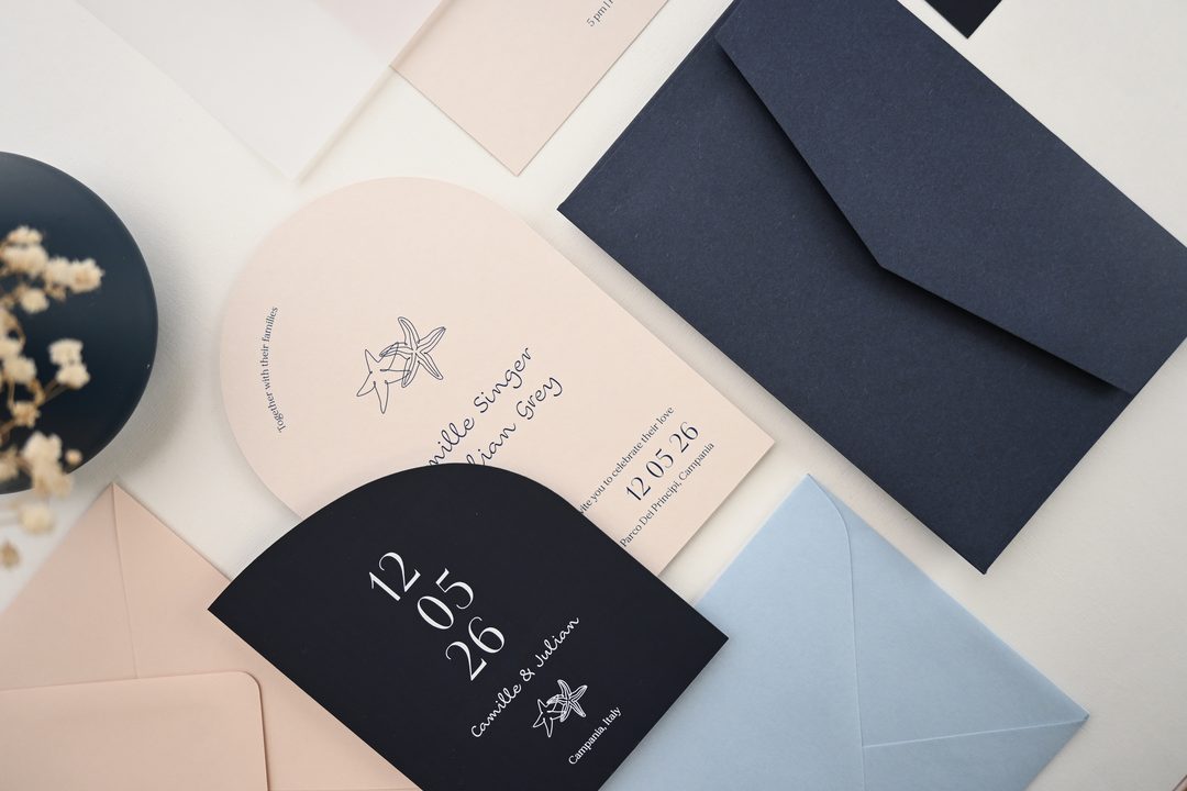 Paperlust invitation, Beautifully styled wedding stationery suite featuring coastal starfish motifs with a blush and navy color palette. Crisp typography
