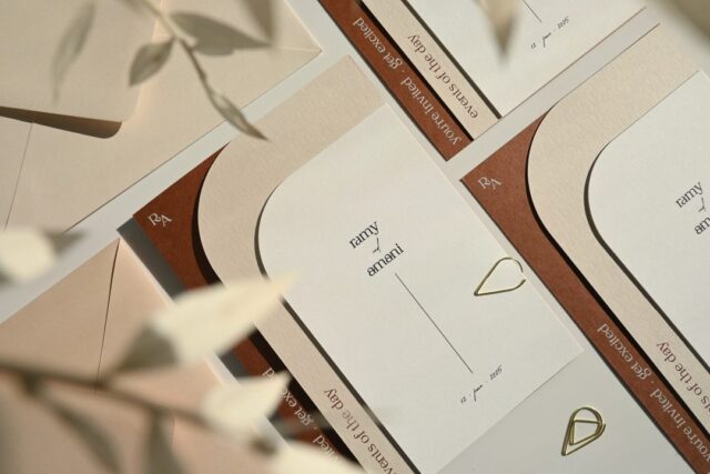 Paperlust invitation, Beautifully styled wedding invitation suite featuring 'Ramy & Amani' names with warm terracotta and cream color palette